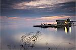 Boat landing moored on Rio Negro at sunset, Manaus, Amazonas, Brazil, South America