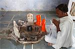 Prayer in a Hindu shrine, Goverdan, Uttar Pradesh, India, Asia