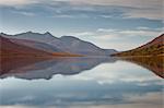 The waters of Loch Etive reflecting the surrounding mountains, Argyll and Bute, Scotland, United Kingdom, Europe