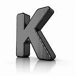 The letter K as a perforated metal object over white