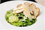 Classic Caesar salad with chicken on a plate