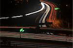 Traffic leaves light trails at the junction of Highway 24 and Highway 13 in Berkeley, California.