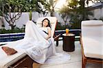 young woman relax in the afternoon at Balinese villa