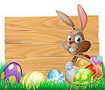 The Easter bunny with a basket of Easter eggs with more Easter eggs around him by a wood sign board