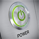 power button on a brushed aluminum panel with a green light and the symbol of energy start, blur effect