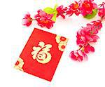 Chinese new year festival decorations on white background, the character on red packet or ang pow means prosperous.