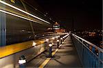 Tram speeding along Ponte Dom Luis I bridge, Oporto, Portugal.