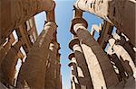 Large columns in hypostyle hall at the ancient temple of Karnak Luxor