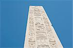 Closeup detail of a large ancient obelisk at the temple of Karnak in Luxor