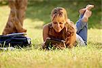 Students and education, young people at school, woman with books and digital tablet computer studying for university exam. Full length