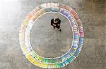 Businesswoman examining paint swatches