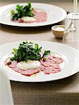 Plate of carpaccio with salad