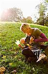 Mother and son playing in park