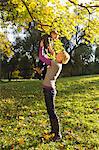 Mother and son playing in park