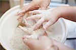 Mother and daughter with sticky hands