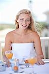 Woman having breakfast outdoors