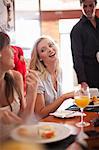 Women having breakfast together in cafe