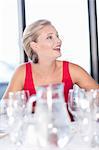 Woman having dinner at restaurant