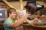 Couple shopping together in thrift store