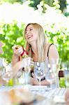 Woman opening presents at party