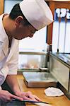 Chef preparing sushi