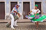 South America, Brazil, a tambor drummer and dancer from the Tambor de Crioula group Catarina Mina, in the streets of Sao Luis MR