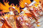 South America, Rio de Janeiro, Rio de Janeiro city, costumed dancers at carnival in the Sambadrome Marques de Sapucai