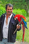 Man with Macaw, Terradentro, Colombia, South America