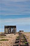 England, Kent, Dungeness. Abandoned railway track on Dungeness beach.