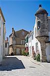 France, Charente Maritime, Ile de Re.  Quiet side street off the village square in Ars en Re.