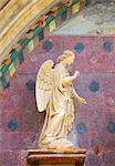 France, Provence, Avignon, Angel sculpture at church entrance