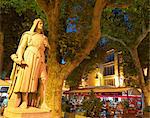 France, Provence, Orange, Place de la Republic, Rimbaud 11 statue at dusk