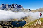 Europe, France, French Alps, Haute Savoie, Chamonix, Servoz valley, hiker above lake MR