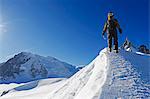 Europe, France, French Alps, Haute Savoie, Chamonix, Aiguille du Midi,  climber walking on the ridge MR