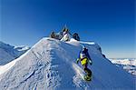 Europe, France, French Alps, Haute Savoie, Chamonix, Aiguille du Midi, snowboarder starting the Vallee Blanche off piste