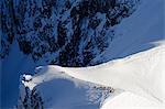 Europe, France, French Alps, Haute Savoie, Chamonix, Aiguille du Midi, skiers on the Vallee Blanche off piste ridge