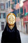 Venice, Veneto, Italy, A masked mannequin outside one of the countless shops in the city selling typical Ventian masks.