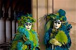 Venice, Veneto, Italy, A masked couple duirng carnival.