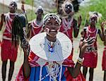 A Maasai schoolgirl sings during an inter schools song and dance competition at Magadi, Kenya