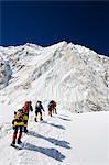 Asia, Nepal, Himalayas, Sagarmatha National Park, Solu Khumbu Everest Region, climbers walking below Nuptse making their way to camp 2 on Mt Everest
