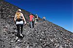 Tourist trekking up Volcan Cerro Negro, Leon, Nicaragua, Central America