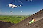 Tourist Surfing down Volcan Cerro Negro, Leon, Nicaragua, Central America