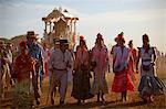 Seville, Andalusia, Spain. Pilgrims dressed in traditional clothes walking to the village of El Rocio during the El Rocio pilgrimage