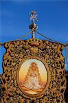 El Rocio, Huelva, Southern Spain. Detail of banner with the picture of the Madonna of El Rocio carried during the annual Romeria and feast