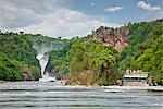 Tourists admire the spectacular Murchison Falls from the safety of a launch, Uganda, Africa