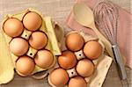 Overhead View of Eggs with Wooden Spoon, Whisk and Napkin