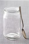 Close-up of Empty Glass Jar and Spoon