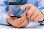 Touchscreen futuristic transparent gadget in businessman hands