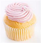 Pink frosted cupcake with flower decoration