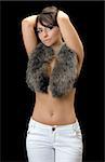 Pretty young brunette in fur. Isolated on black